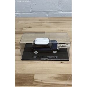 Bburago Blue/White die-cast model with plastic 2001 Mini Cooper‎